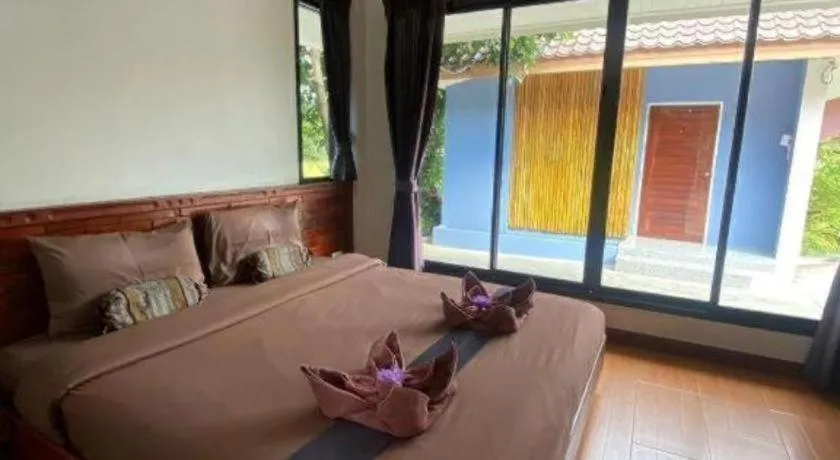 Bed in Baan Home Resort