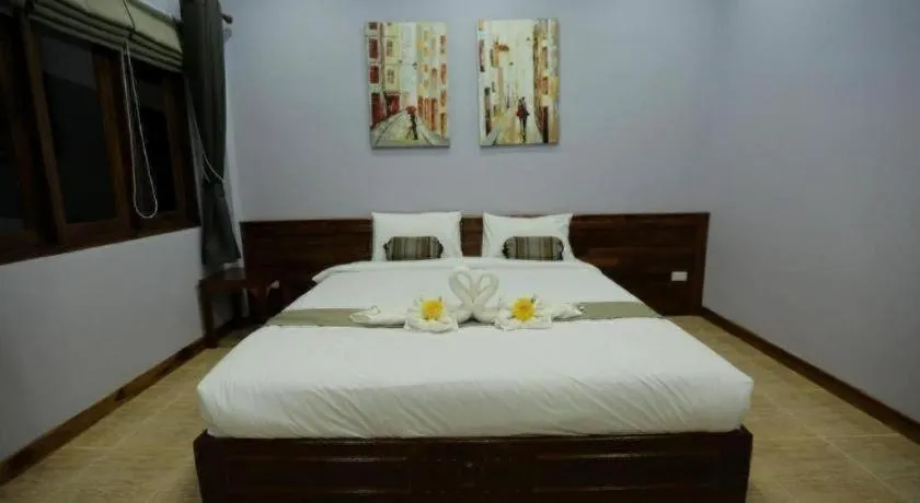Bed in Baan Home Resort