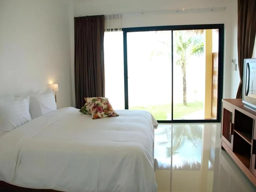 Bed in Villa Phra Chan Resort