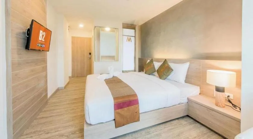 Bed in B2 Phrae Boutique and Budget Hotel