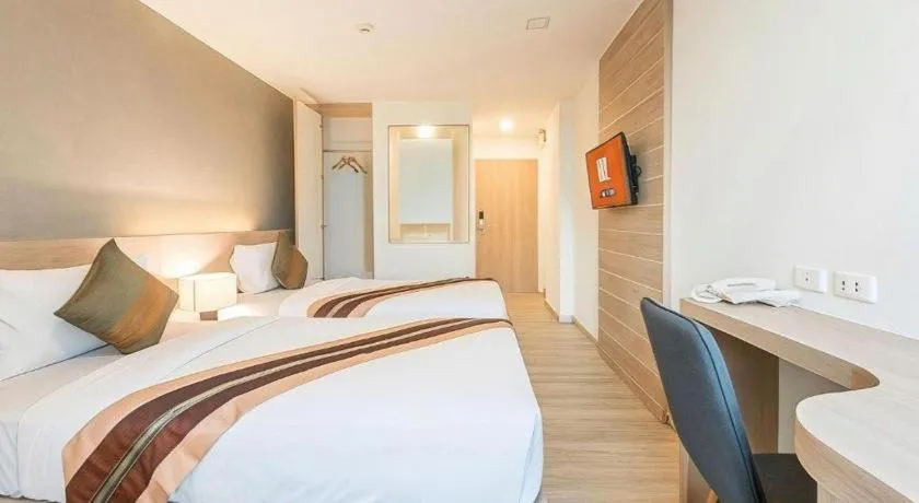 Bed in B2 Phrae Boutique and Budget Hotel