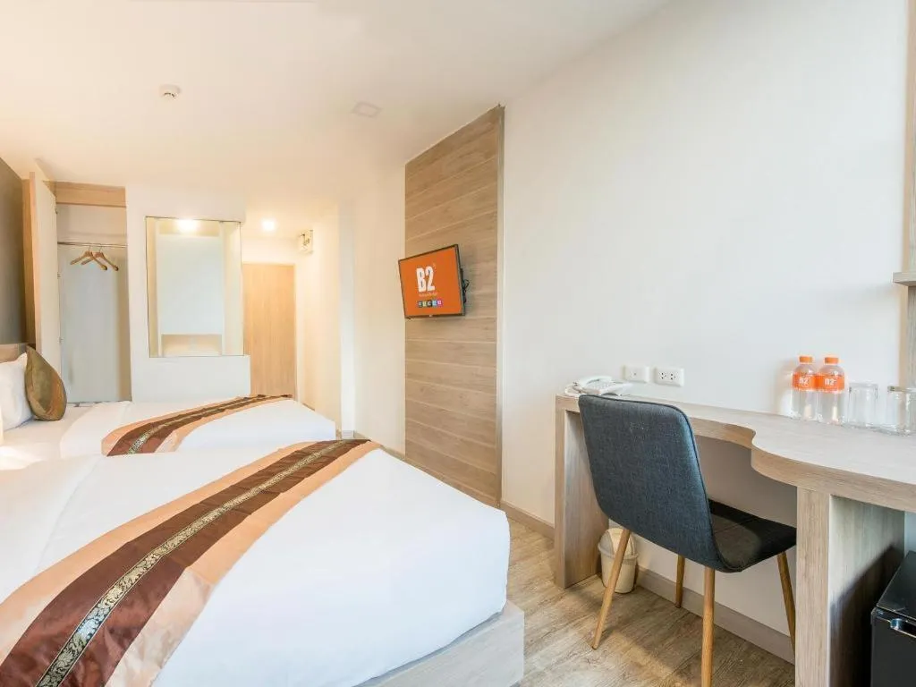 Bed in B2 Phrae Boutique and Budget Hotel