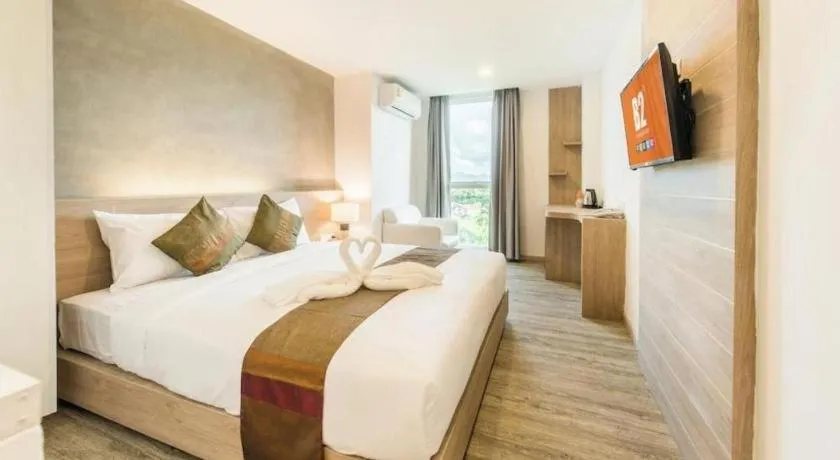 Bed in B2 Phrae Boutique and Budget Hotel