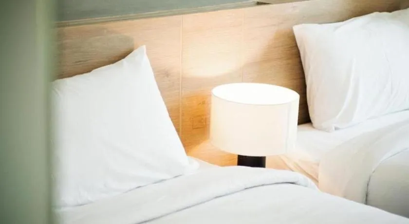 Bed in B2 Phrae Boutique and Budget Hotel