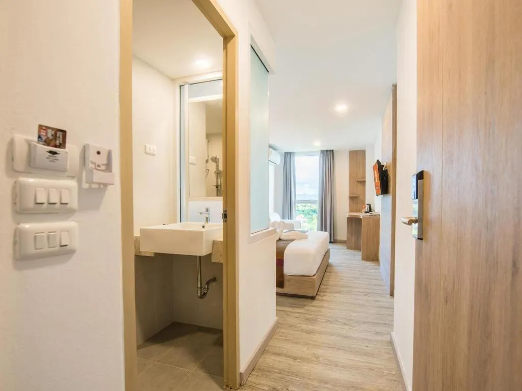 Bed in B2 Phrae Boutique and Budget Hotel