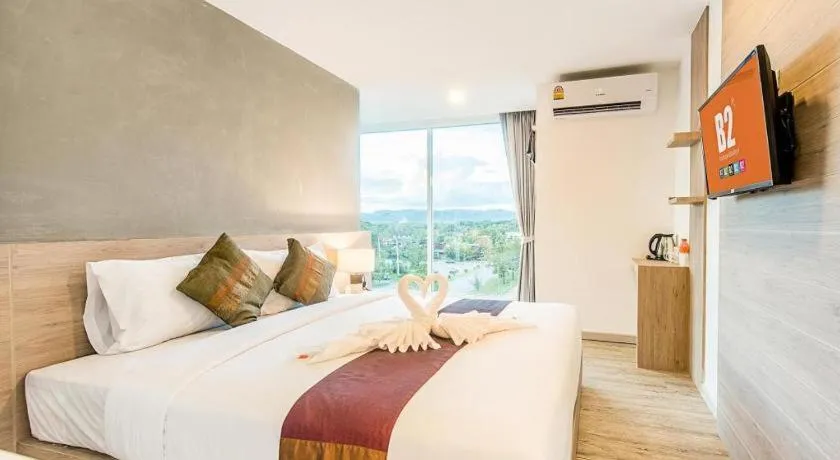 Bed in B2 Phrae Boutique and Budget Hotel
