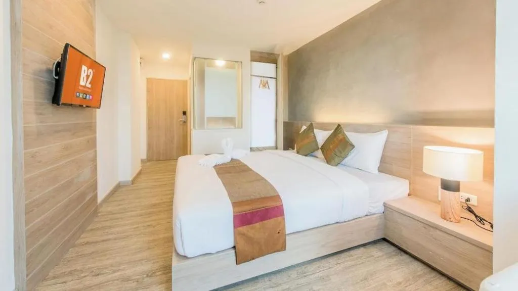 Bed in B2 Phrae Boutique and Budget Hotel