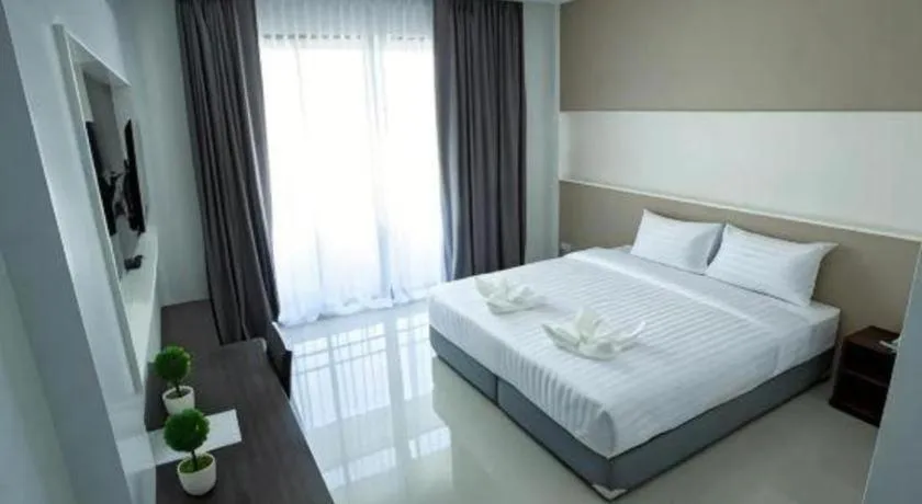 Bed in S-Tawan Hotel & Convention