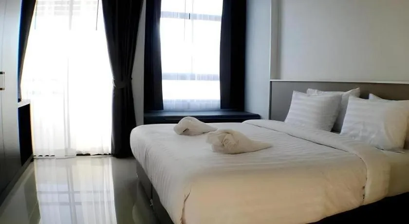 Bed in S-Tawan Hotel & Convention