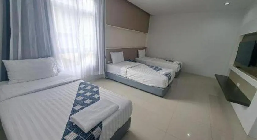 Bed in S-Tawan Hotel & Convention