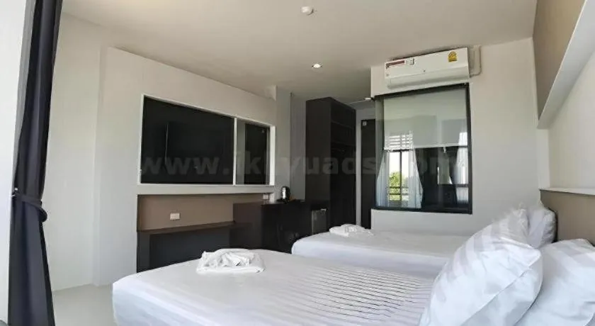 Bed in S-Tawan Hotel & Convention