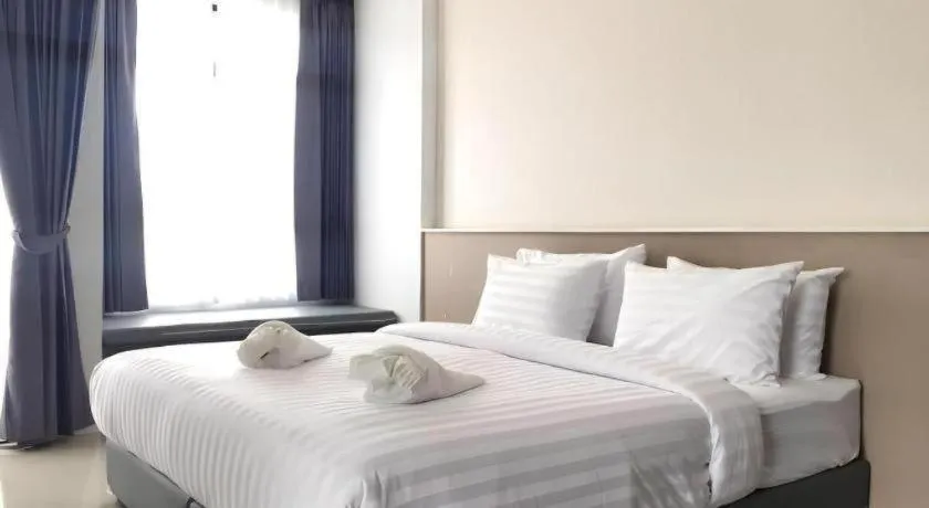 Bed in S-Tawan Hotel & Convention