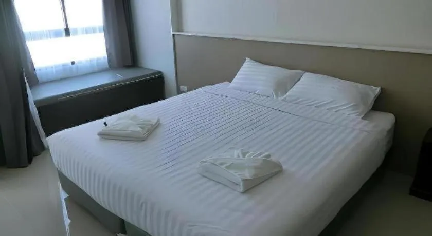 Bed in S-Tawan Hotel & Convention