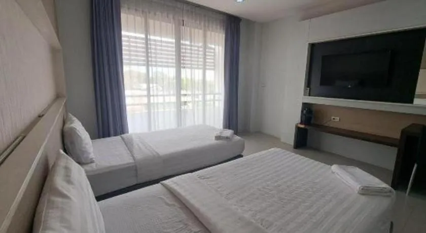 Bed in S-Tawan Hotel & Convention