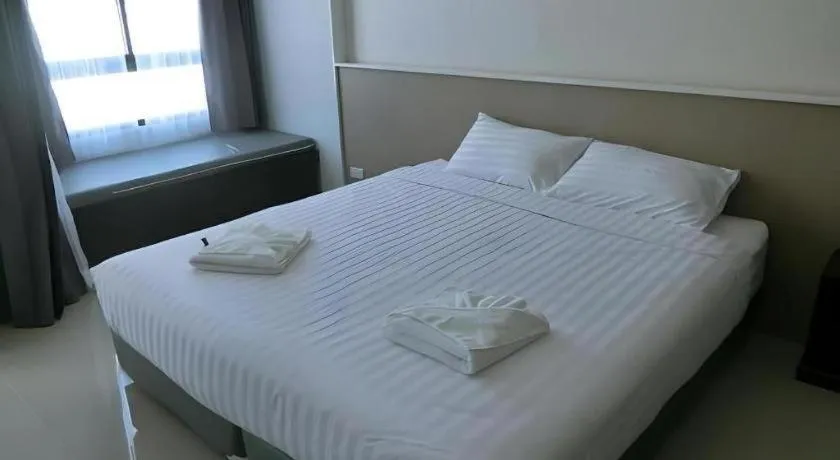 Bed in S-Tawan Hotel & Convention