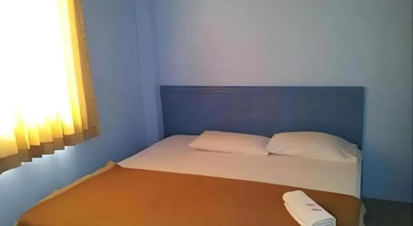 Bed in Centaur Inn Hotel