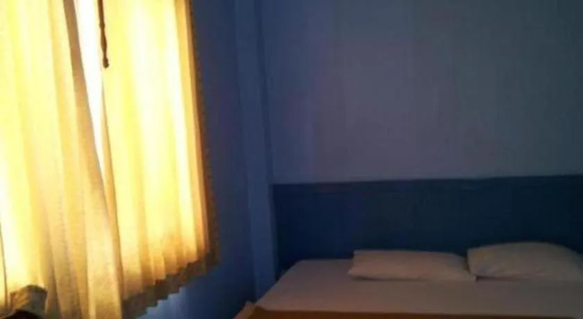 Bed in Centaur Inn Hotel