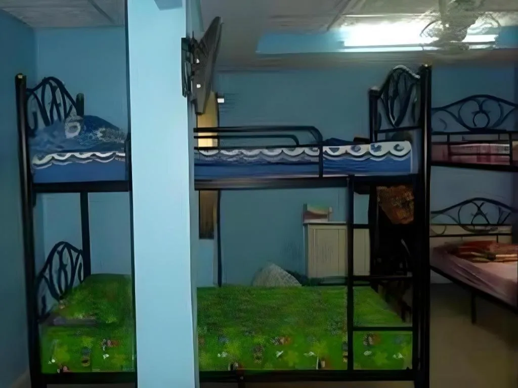 Bed in Centaur Inn Hotel