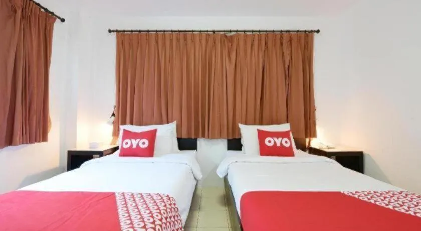 Bed in OYO 520 Pattaya Cantina