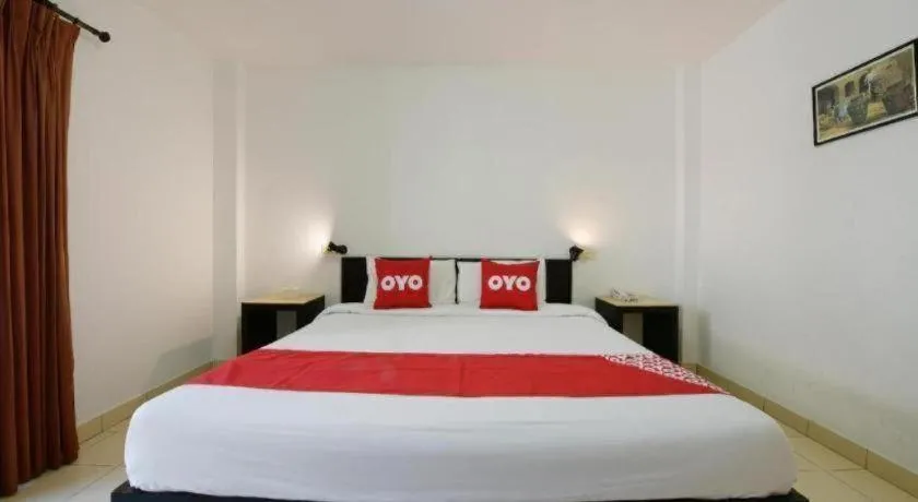 Bed in OYO 520 Pattaya Cantina