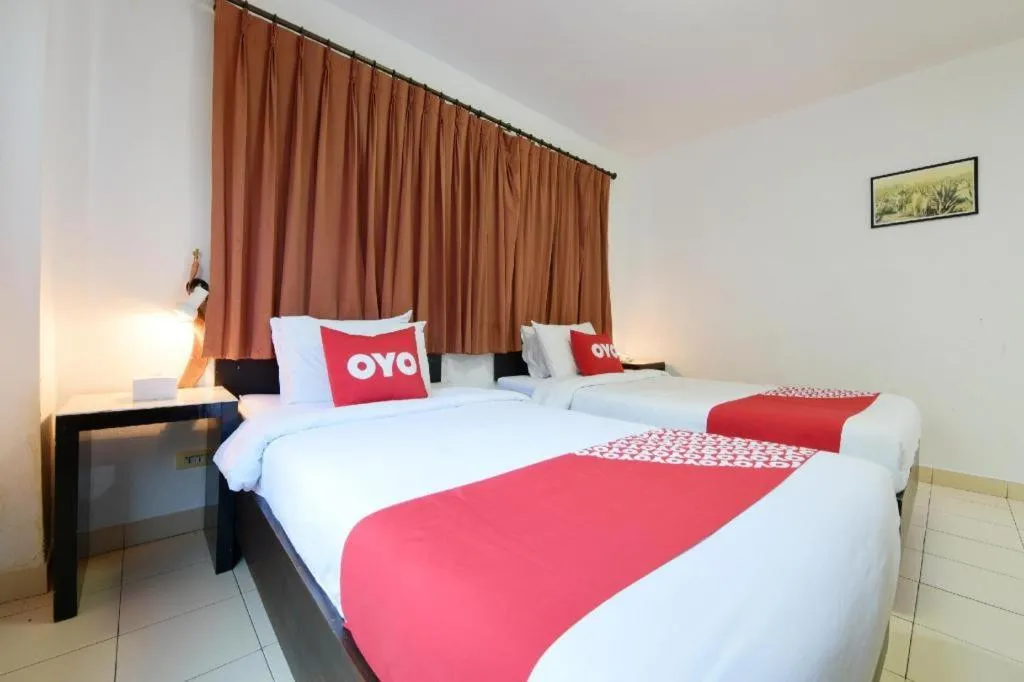 Bed in OYO 520 Pattaya Cantina