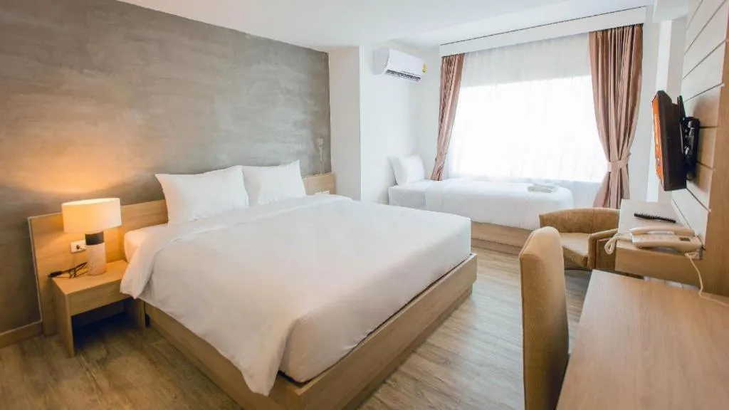 Bed in B2 Nakhonsawan Premier Hotel