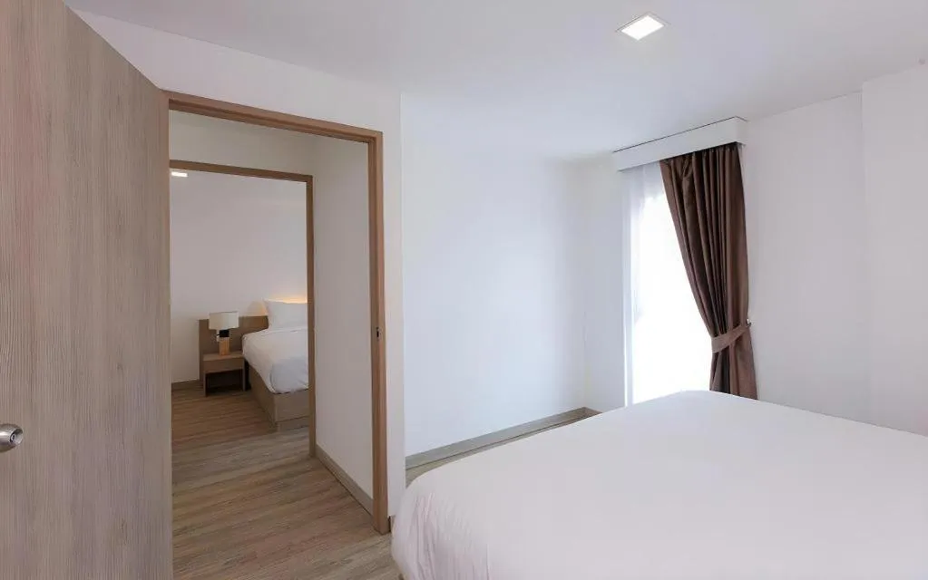 Bed in B2 Nakhonsawan Premier Hotel