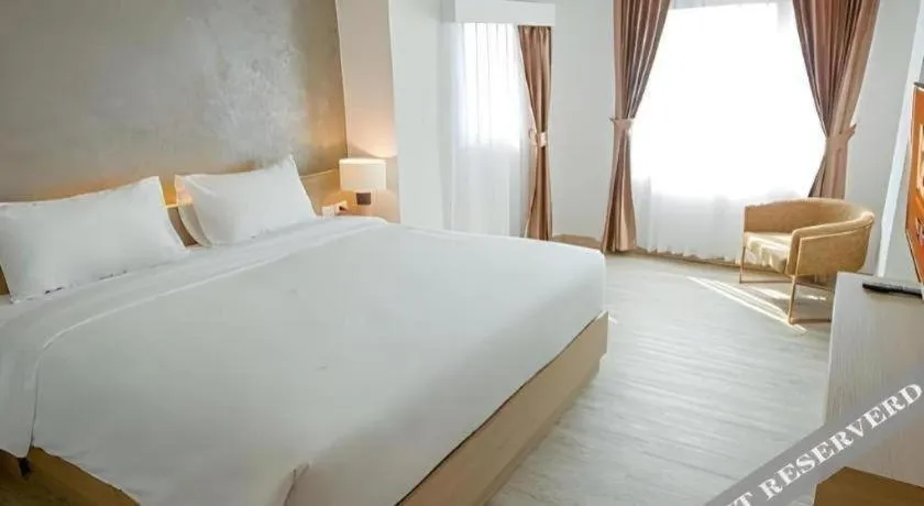 Bed in B2 Nakhonsawan Premier Hotel