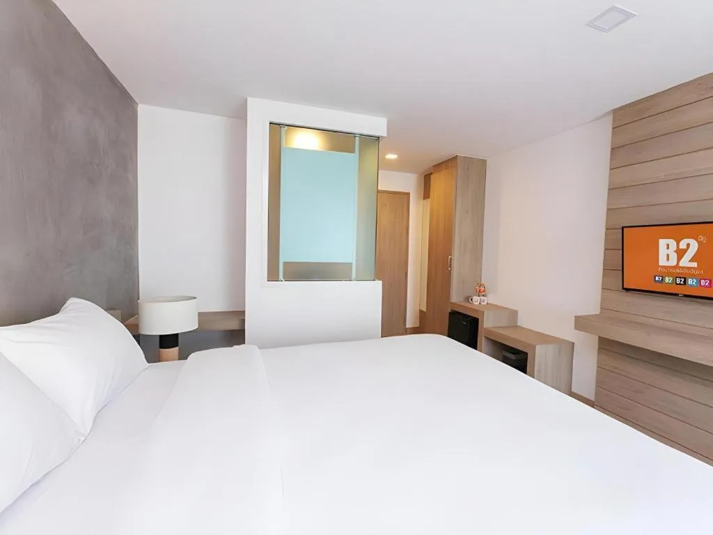 Bed in B2 Nakhonsawan Premier Hotel