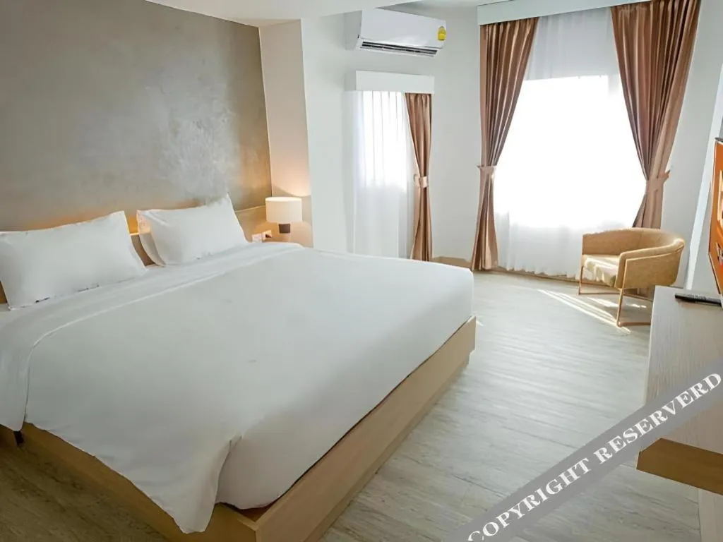 Bed in B2 Nakhonsawan Premier Hotel