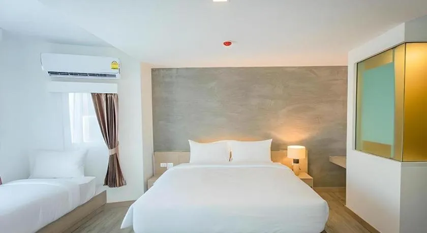 Bed in B2 Nakhonsawan Premier Hotel