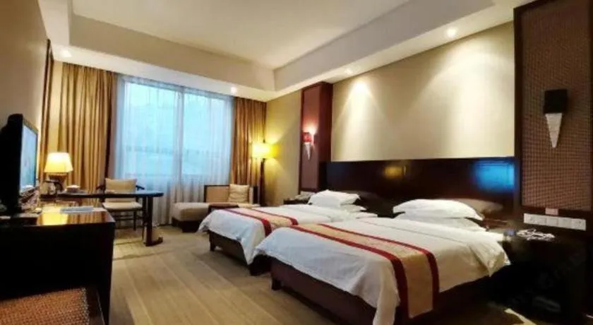 Bed in Longyan Capital International Hot Spring Resort