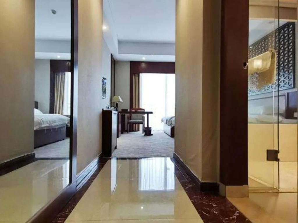 Bed in Longyan Capital International Hot Spring Resort