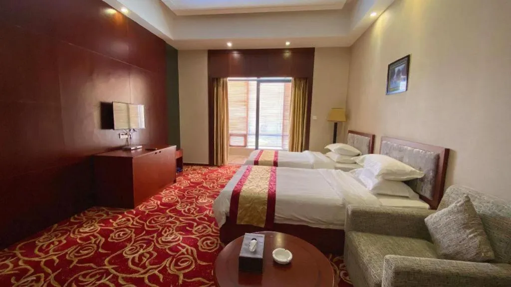 Bed in Longyan Capital International Hot Spring Resort