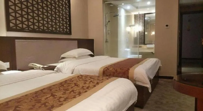 Bed in Longyan Capital International Hot Spring Resort