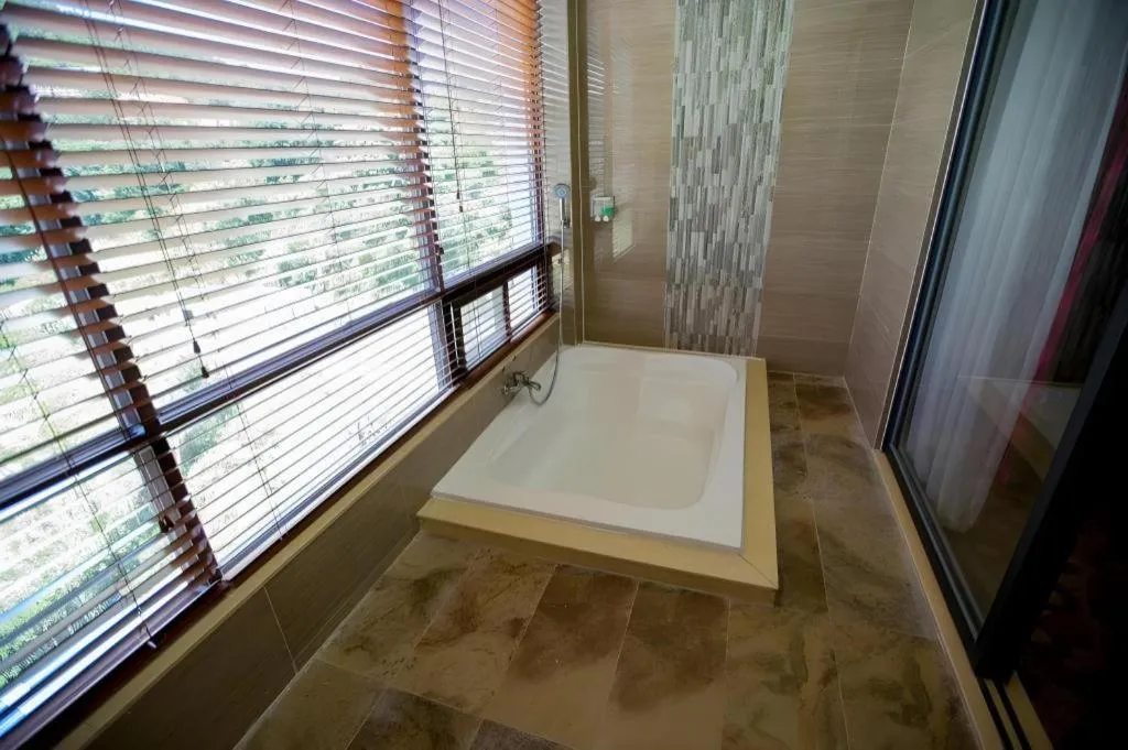 Bed in Longyan Capital International Hot Spring Resort