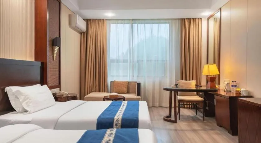 Bed in Longyan Capital International Hot Spring Resort