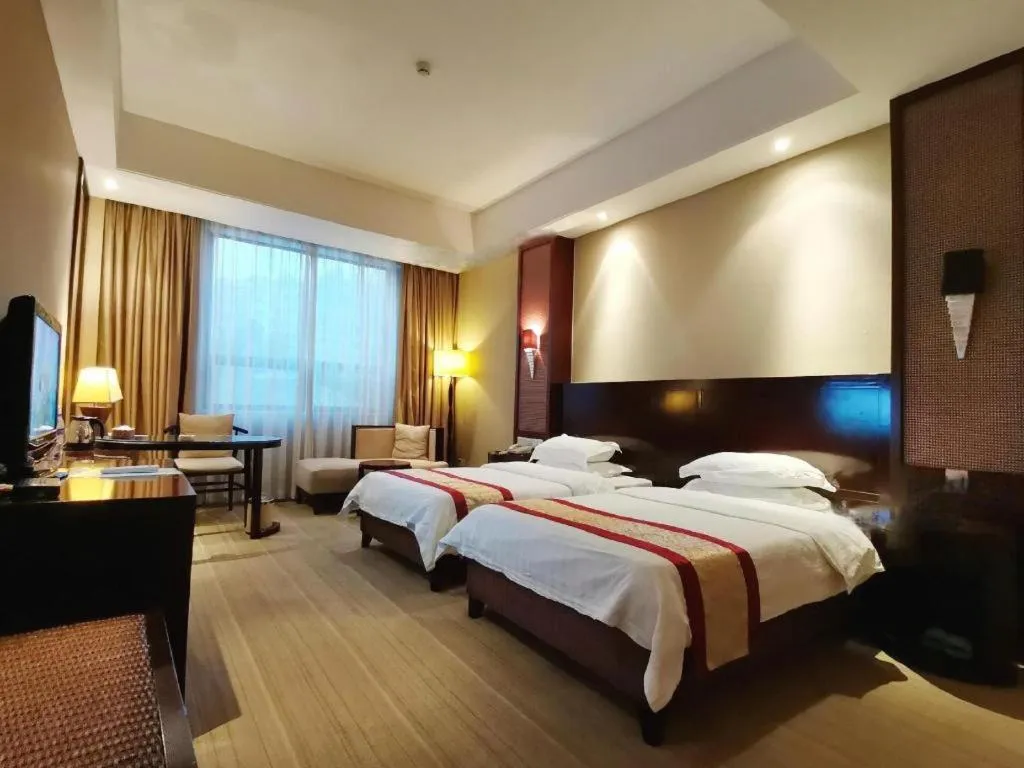 Bed in Longyan Capital International Hot Spring Resort
