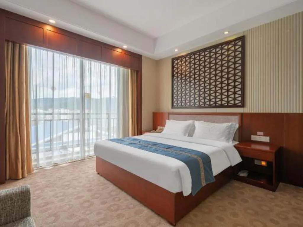 Bed in Longyan Capital International Hot Spring Resort