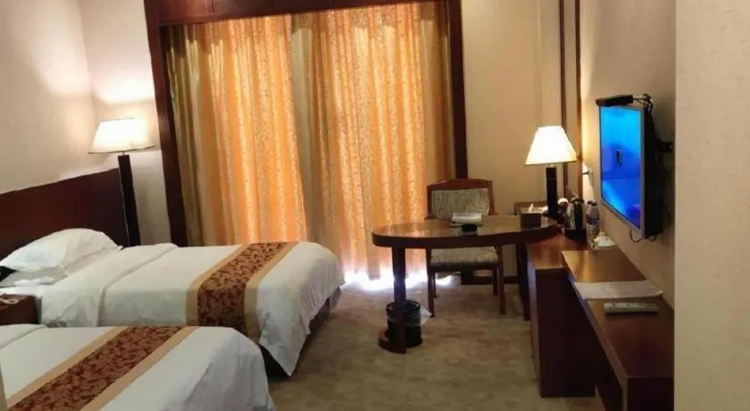 Bed in Longyan Capital International Hot Spring Resort