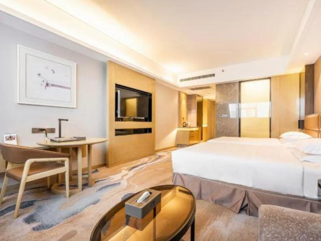 Bed in Licai Tianqi Hotel