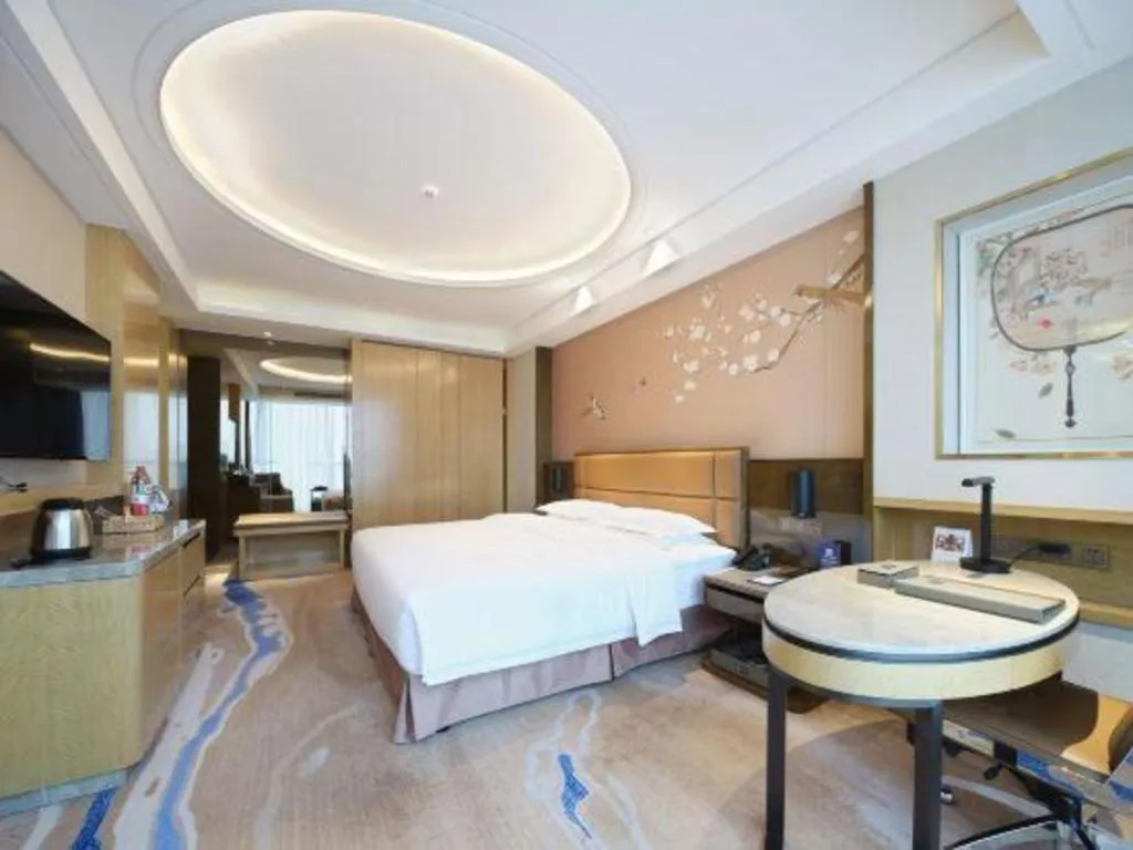 Bed in Licai Tianqi Hotel