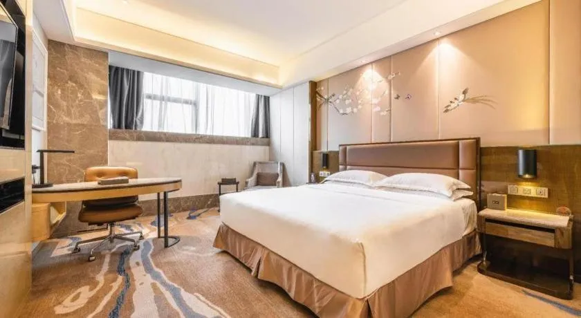 Bed in Licai Tianqi Hotel