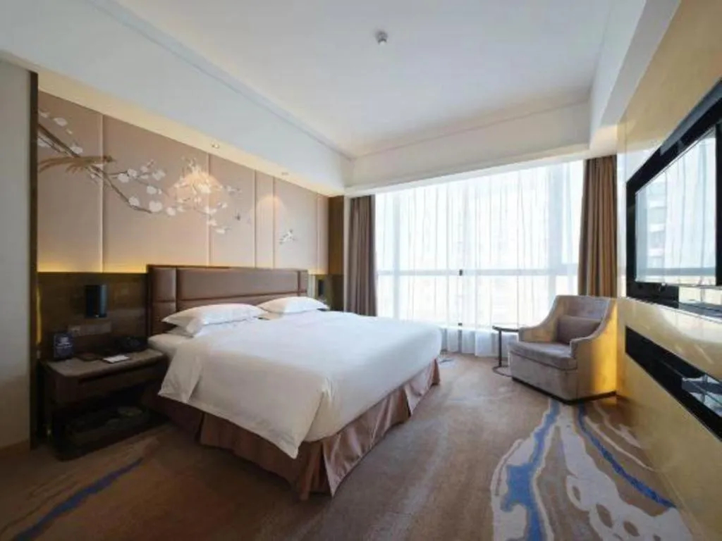 Bed in Licai Tianqi Hotel