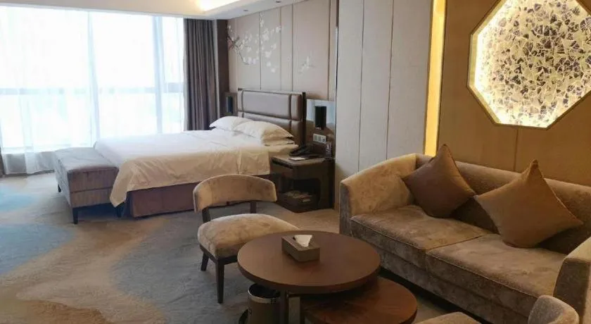 Bed in Licai Tianqi Hotel