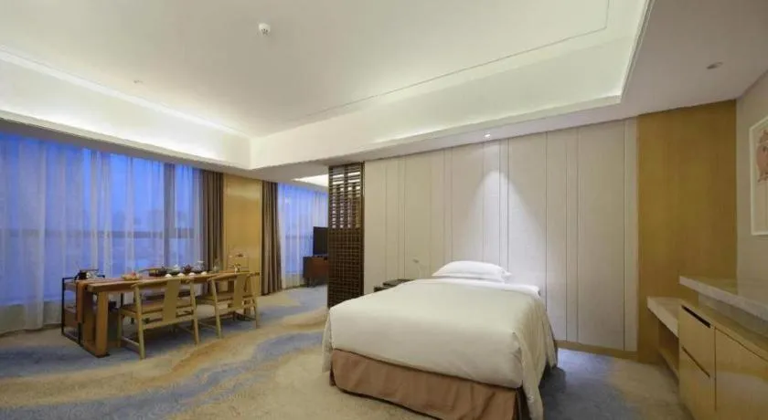 Bed in Licai Tianqi Hotel