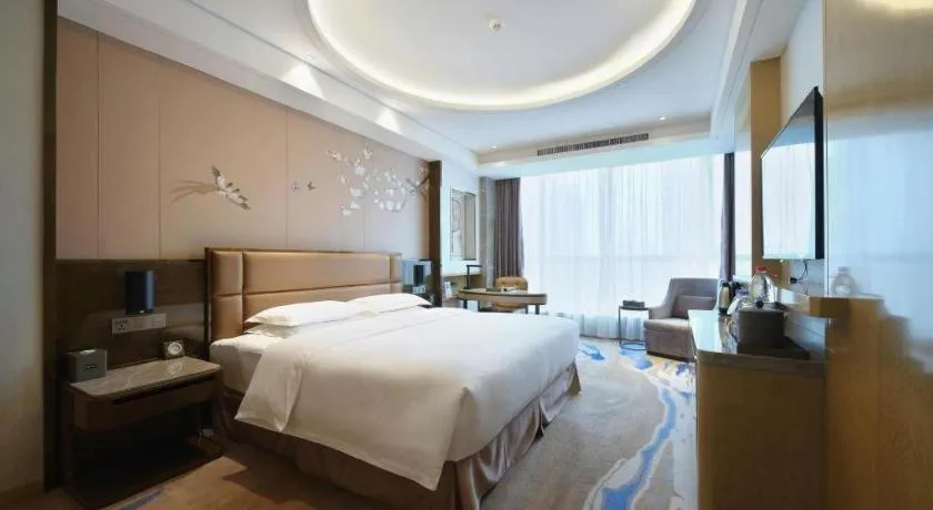 Bed in Licai Tianqi Hotel