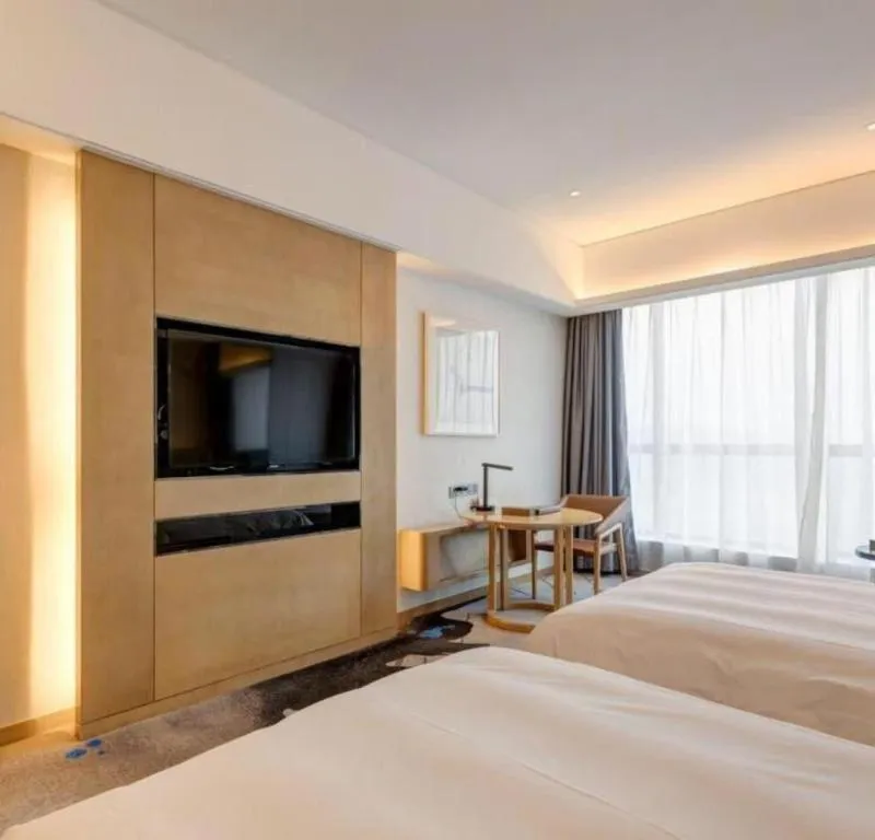 Bed in Licai Tianqi Hotel