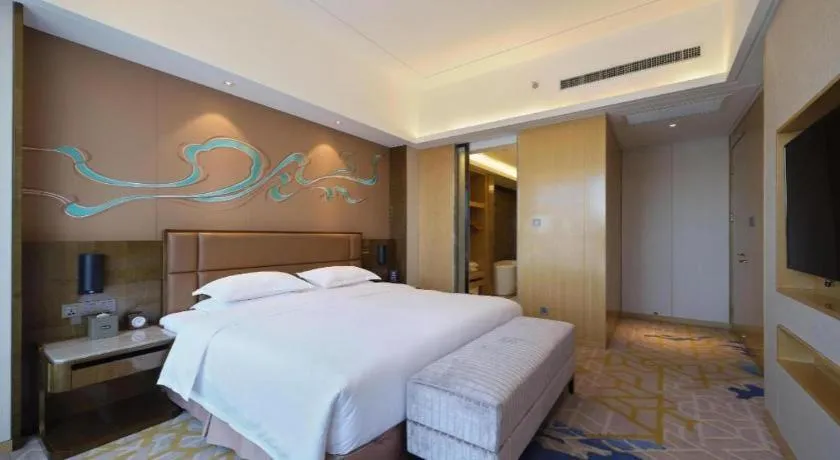 Bed in Licai Tianqi Hotel
