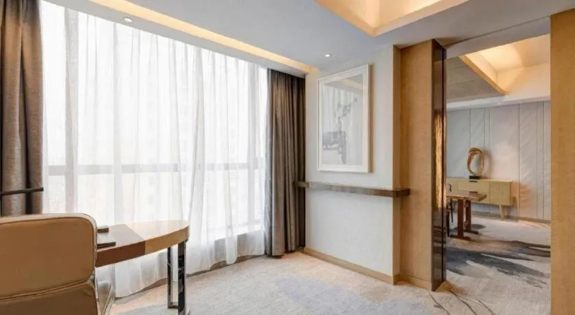 Bed in Licai Tianqi Hotel